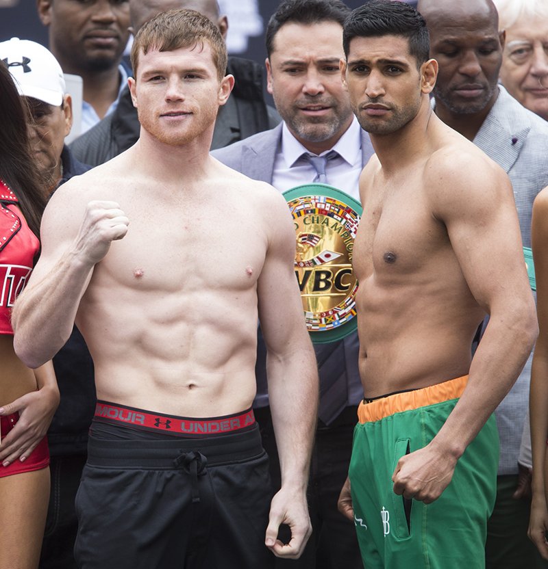 .@Canelo and @amirkingkhan during their weigh-in at Toshiba Plaza in Las Ve...