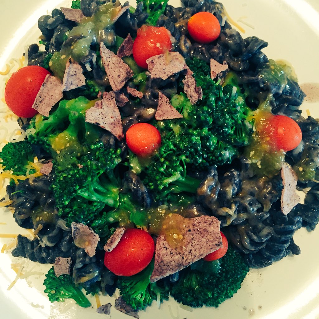 TrustYourHunger's tweet photo. Trader J's black bean pasta, broc, tomatoes, cheese, salsa, baked chips @UCLAhousing @TraderJoesList https://t.co/fTBRjwiXyk