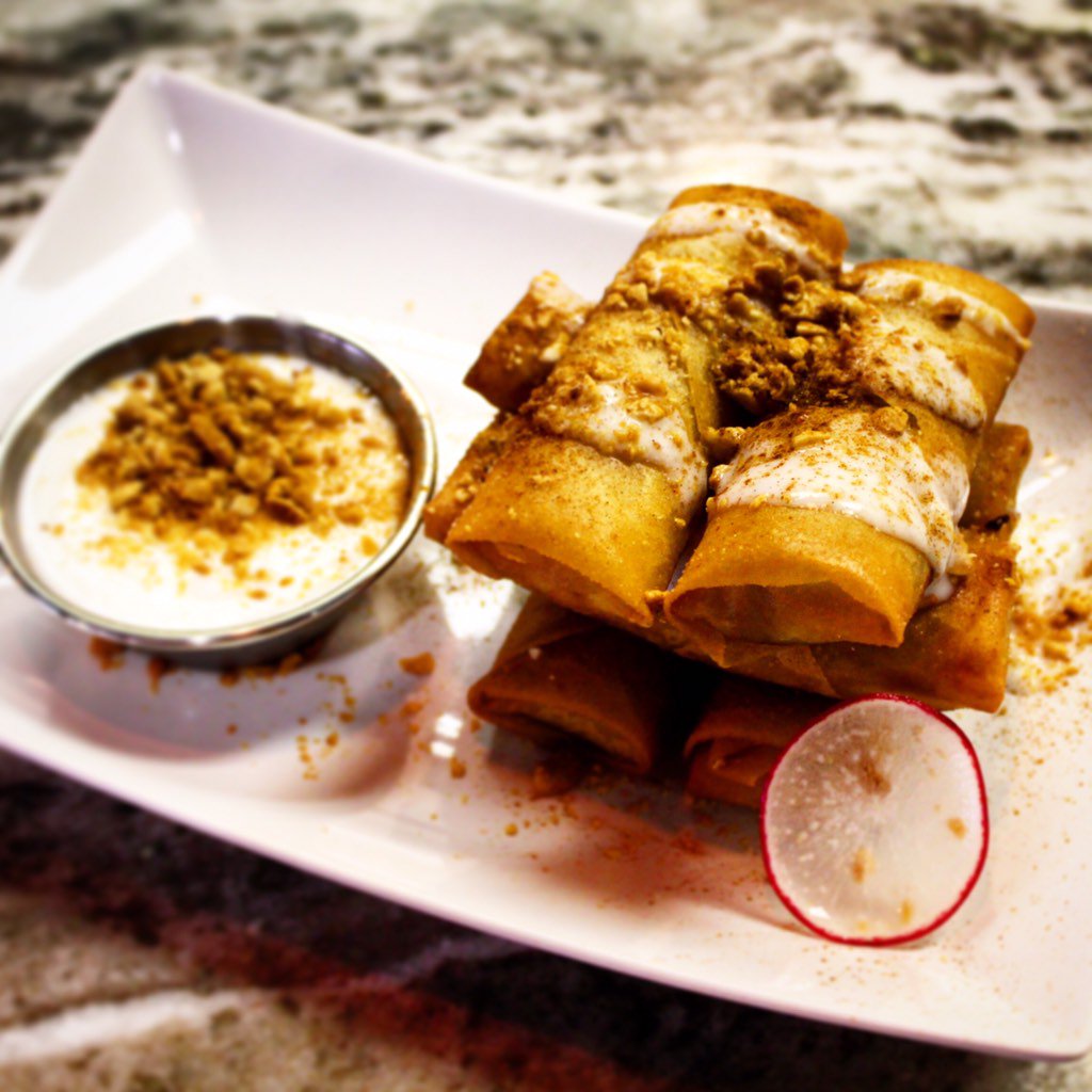 Fried banana with coconut creme, crushed peanuts, and cinnamon dust only <a href="/meconbistro/">Me. Con Bistro</a>