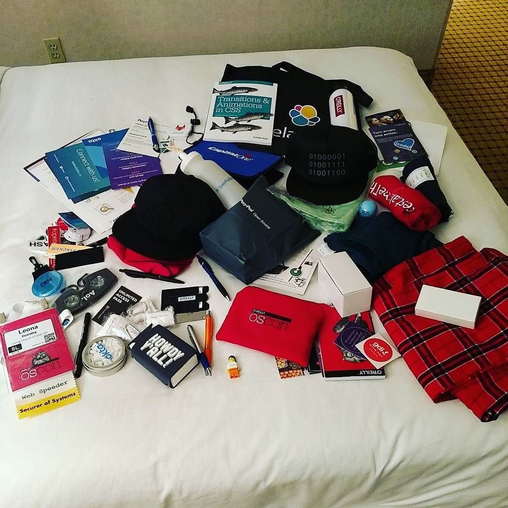 TheLioness22's tweet photo. Time to try and pack! Too much swag for my bag?? #oscon2016 https://t.co/XL4C7mw297 https://t.co/LCFErhDFbB