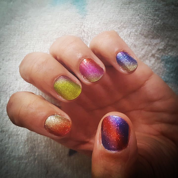 swanny's tweet photo. Loving my rainbow nails #jamberry #rainbow #nails #nailart #colourful #ukblogger #hands #igmum #beautiful #beautybl… https://t.co/xjftR7P7Sq
