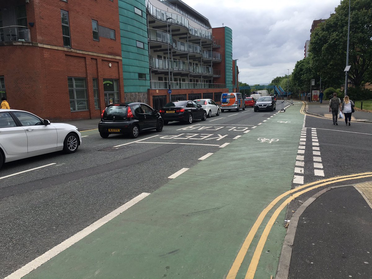 JonathSchofield's tweet photo. The way Salford cycle lanes are overused is impressive. Good job other road users aren't inconvenienced by queues https://t.co/E3vO3t4U8l