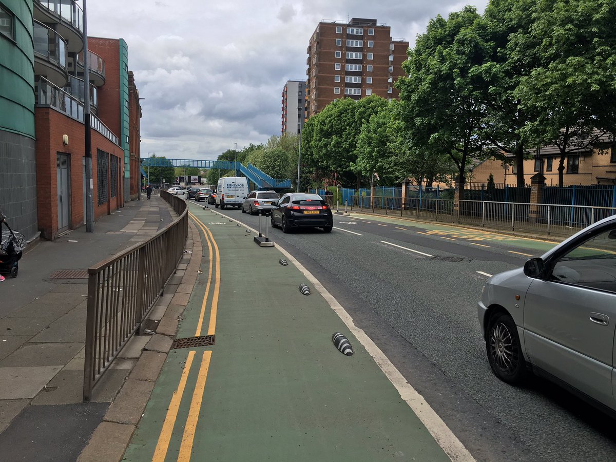 JonathSchofield's tweet photo. The way Salford cycle lanes are overused is impressive. Good job other road users aren't inconvenienced by queues https://t.co/E3vO3t4U8l