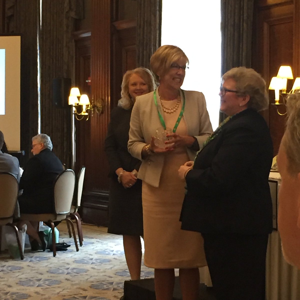 bcgcompany's tweet photo. @PamWright1 receiving her Woman of Distinction Award. https://t.co/3YKw2HzFnL