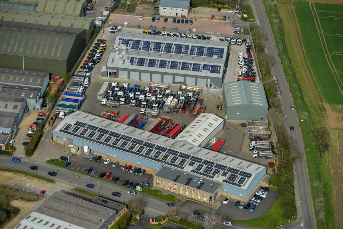 #home Arial shot of our new factory along side our existing one, complete with a modern paint shop and ATF lane.