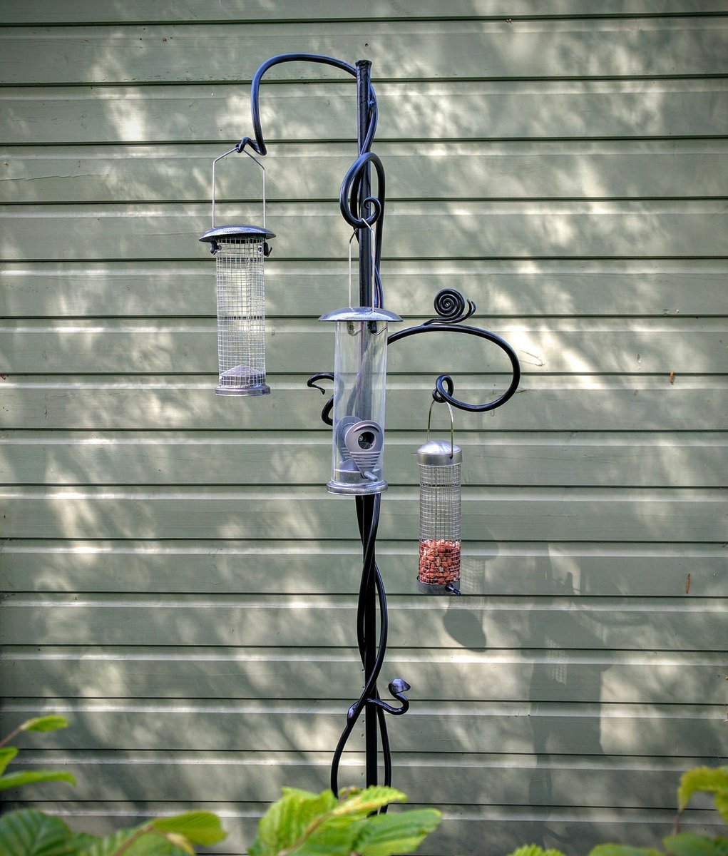 Handforged bird feeder (with uninvited guest). Made for @1simplyhair Happy Birthday! #birds #birdfeeder #moderntwist