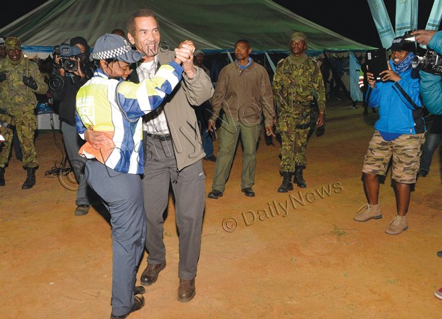 BWGovernment's tweet photo. President #Khama dancing with Constable Kegakilwe during the #Khawa Sand Dune Challenge &amp; Cultural #PolkaNight 🇧🇼 https://t.co/Flebz3OJxB