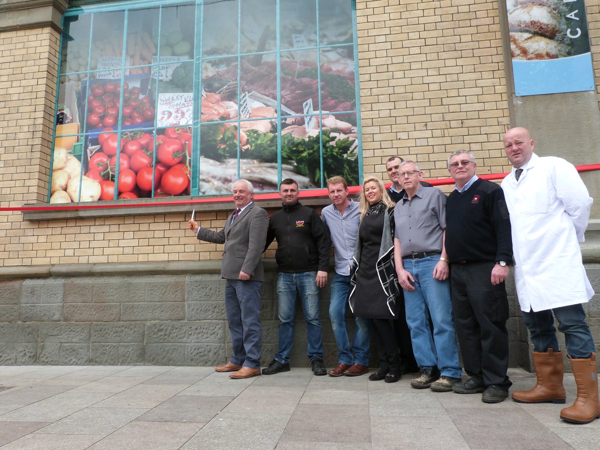 cardiffcouncil's tweet image. Cllr Hinchey cuts the ribbon on Cardiff Market’s colourful
new look!