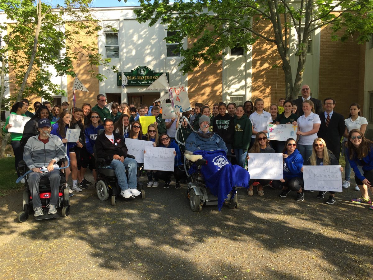 Students from Riverhead HS and McGann Mercy escort PALS Christopher Pendergast, Clinton Strait and Frank Verdone