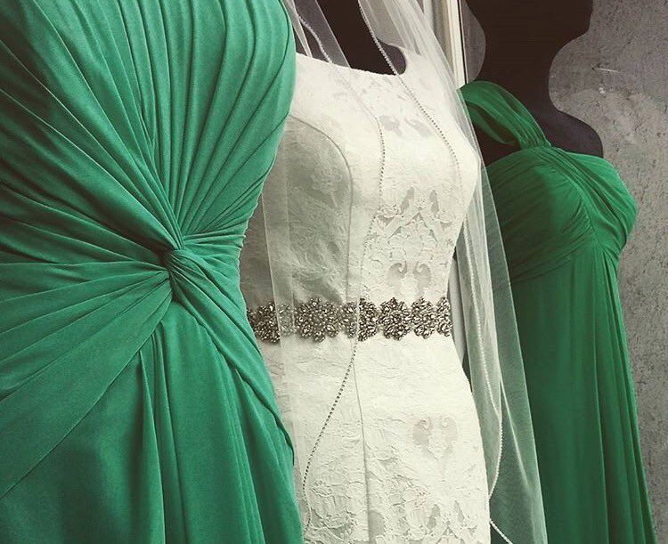 Our emerald inspired window this week. #windowdisplay #bridalgown