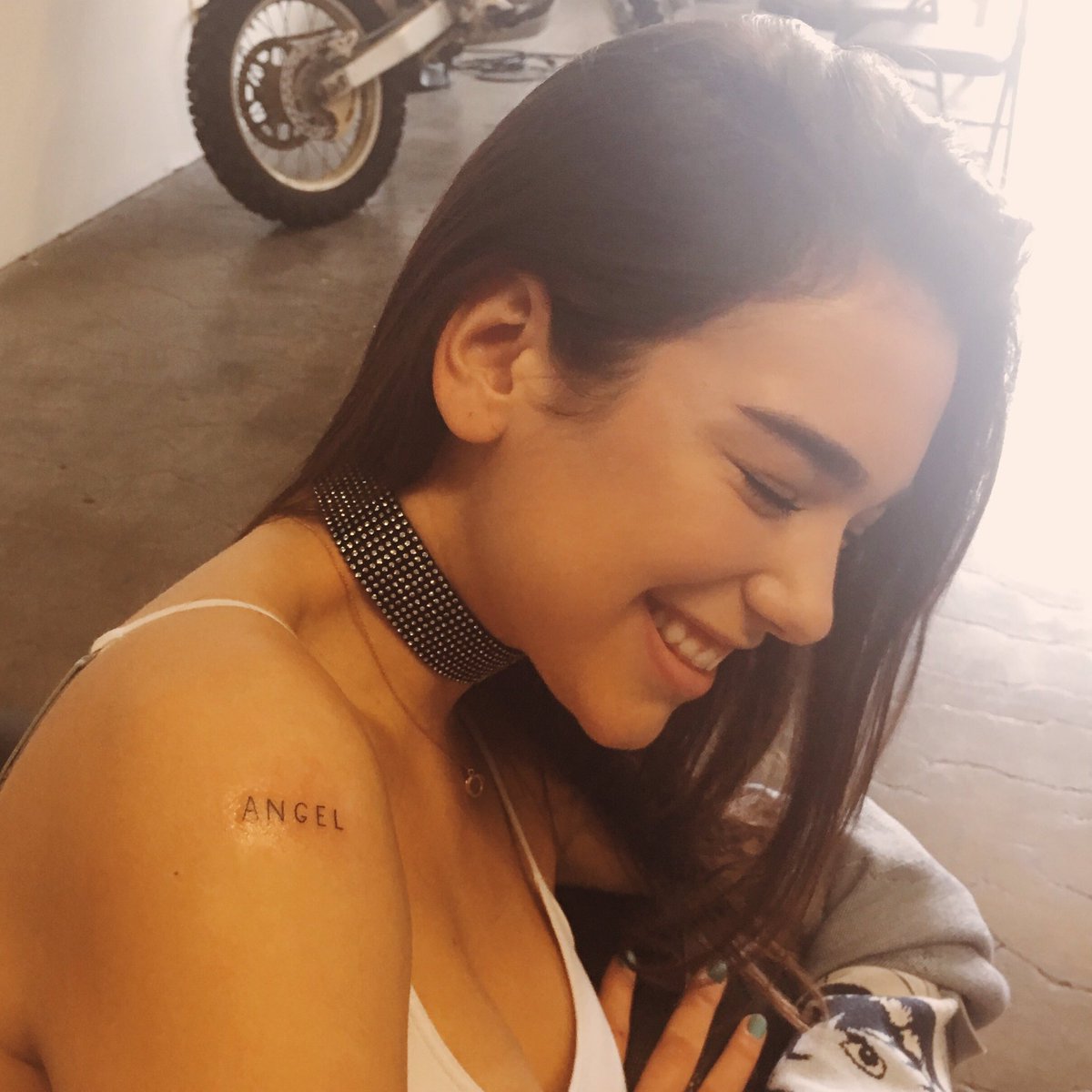 free angel tattoo dua lipa| white ink tattoos | small white ink tattoos | white ink tattoos on hand | white ink tattoo artists | skull tattoos | unique skull tattoos | skull tattoos for females | skull tattoos on hand | skull tattoos for men sleeves | simple skull tattoos | best skull tattoos | skull tattoos designs for men | small skull tattoos | angel tattoos | small angel tattoos | beautiful angel tattoos | angel tattoos sleeve | angel tattoos on arm | angel tattoos gallery | small guardian angel tattoos | neck tattoos | neck tattoos small | female neck tattoos | front neck tattoos | back neck tattoos | side neck tattoos for guys | neck tattoos pictures