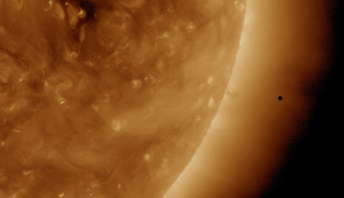 NASASun's tweet photo. The #MercuryTransit may be over, but the planet is just visible off the sun's edge in these #SDO images! https://t.co/0dVpwONuPE