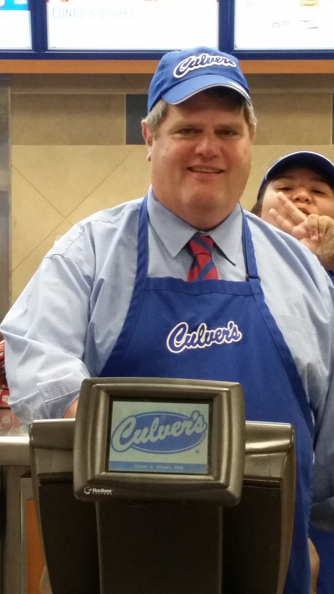 Dr.  Burkey running the register@Dist158