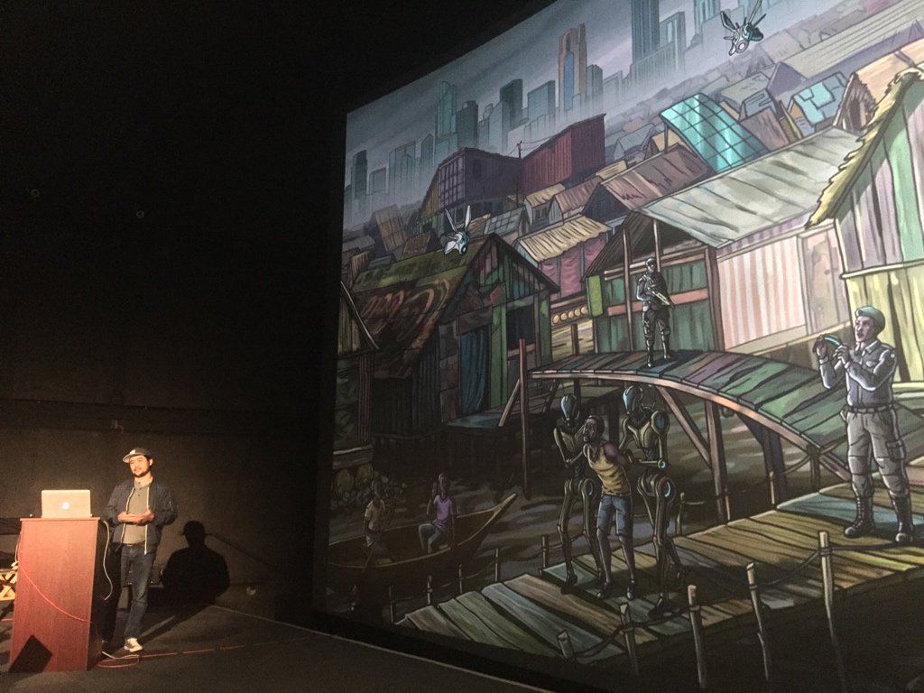 Ruslan introduces Tejumola, the creator of a virtual reality platform that local authorities attack as a new drug.