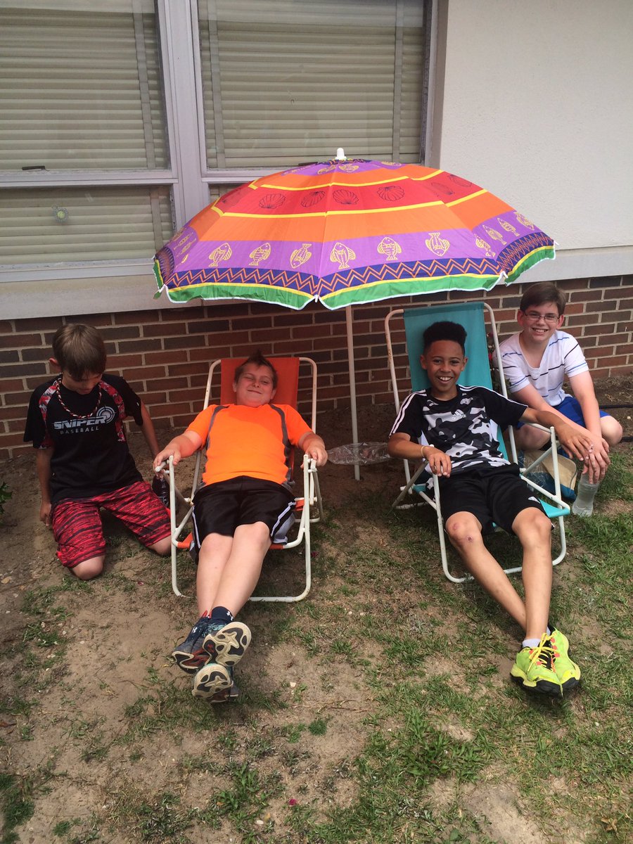 Relaxing after completing a year of service in their reading garden  <a href="/RFESTigers/">Rockfish Elementary</a> @rockfish5th #juniorbeta