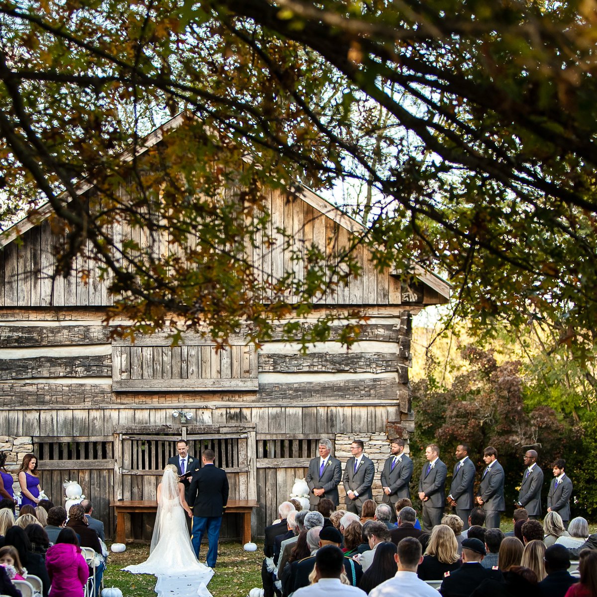 A ceremony in front of the #barn of the victorian #farmhouse at the Cool Springs house in #FranklinTN.