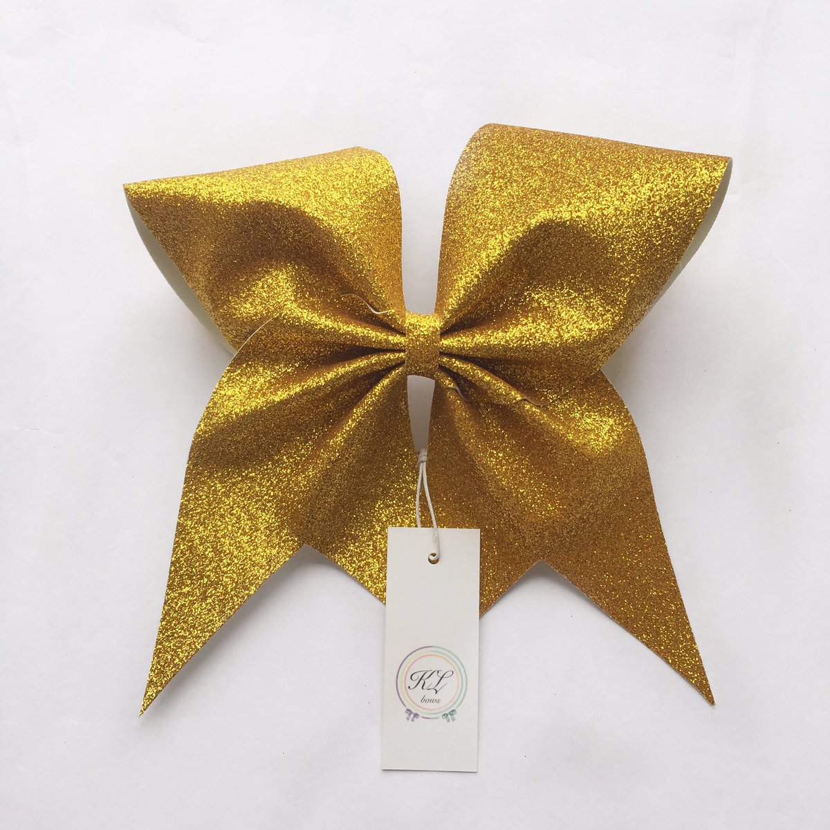 KL_Bows's tweet photo. Newest colours available on our website! Fuchsia & Yellow Gold #klbows #glitter #cheer #cheerleader #glitterbows https://t.co/1lK7M4Q60s