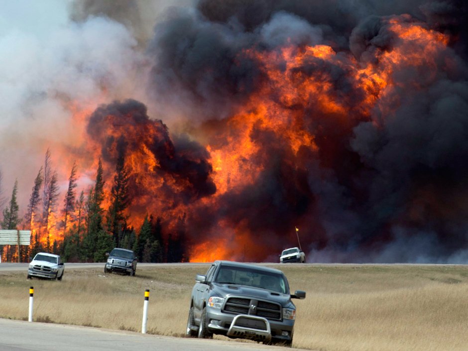 nationalpost's tweet photo. Debunking the Fort McMurray rumours: No, ISIL and Rachel Notley didn’t start the fire https://t.co/G8Nnvf4JyT https://t.co/DKCJ9ByvvQ