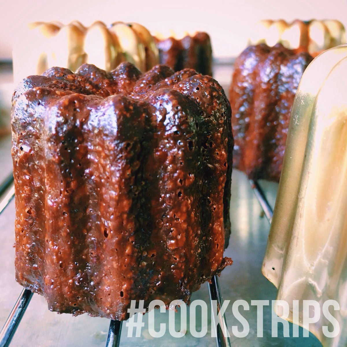 cookstrips's tweet photo. Cannelé recipe testing. You can see the crunchy crust; take my word for the custardy interior @obsfood #cookstrips https://t.co/jRkQGhlig2