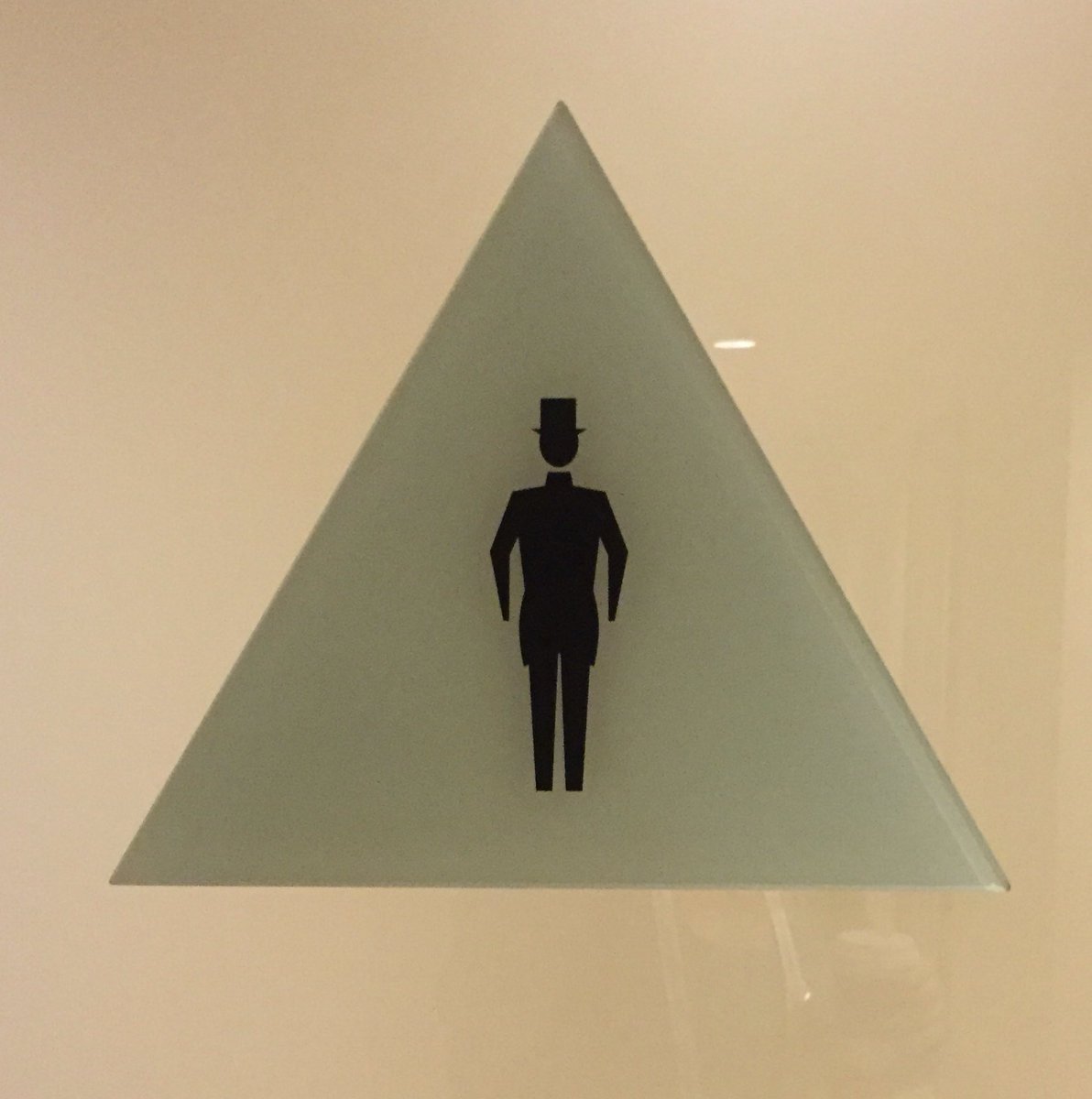 VicJams's tweet photo. I love how dapper the silhouette on the men's restroom door is at the @JWMarriott @LALIVE #fancy #tophatandshorts https://t.co/5rl1CPoKkw