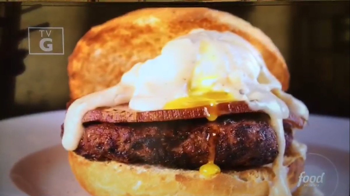 "Look at that yolk just running." - <a href="/Chefsymon/">michael symon</a> chowing down on our famous Croque Madame Burger.