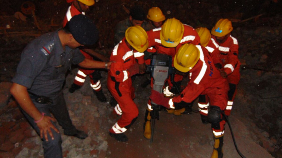 NDRFHQ's tweet photo. 18 years old Munesh rescued from three story collapsed RCC building at Meerut , UP by NDRF . https://t.co/gugX10cUC7