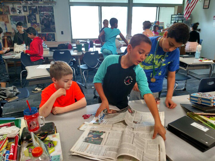 MREteam4's tweet photo. Working together preparing for tomorrow's Newspaper Shopping Bag Challenge.  Who's bag will make it? #collaboration https://t.co/H0stEu7yaC