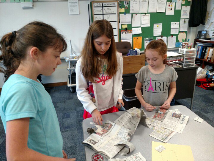 MREteam4's tweet photo. Working together preparing for tomorrow's Newspaper Shopping Bag Challenge.  Who's bag will make it? #collaboration https://t.co/H0stEu7yaC