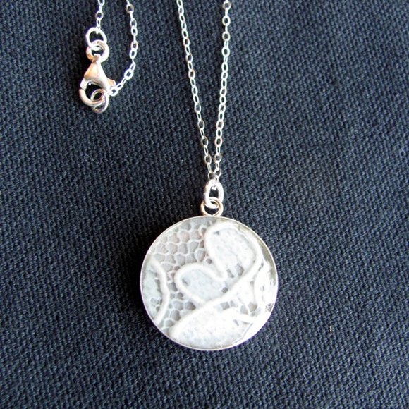 Place some of your lace in a locket for a forever memory.