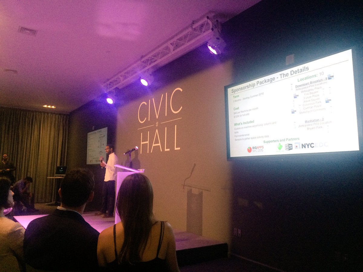ppolitics's tweet photo. Tommy Mitchell of CityCharge NYC presents his truly hyper-local community-building charging &amp; wifi stations #bigapps https://t.co/jDAEWG9Vm6