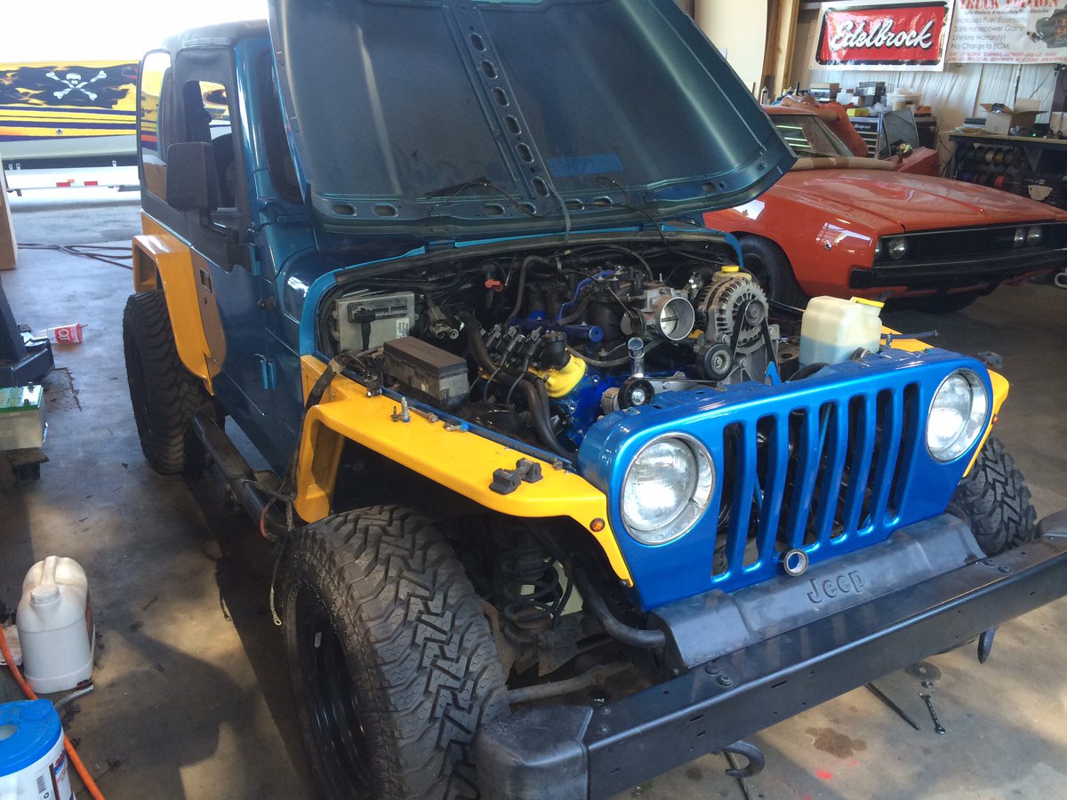 AutoAddictionOk's tweet image. Ls swap in Jeep TJ nearing completion.