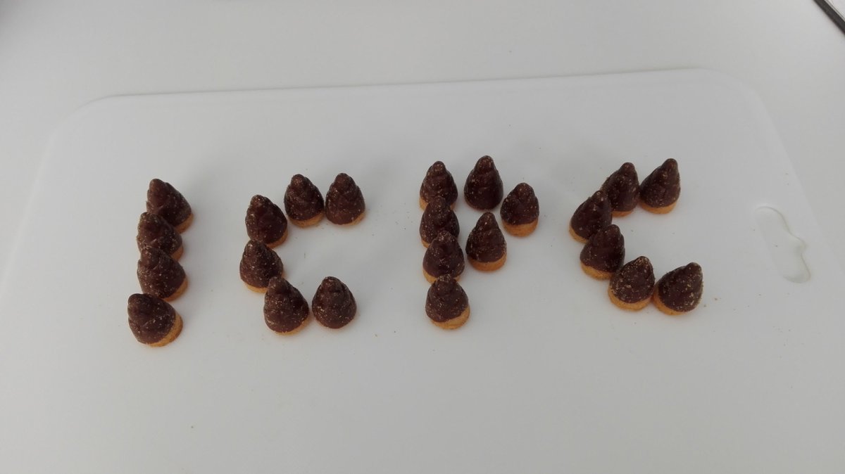 yfukuda_icpc's tweet photo. The pieces are "Takenoko no sato" which are the most delicious chocolate snack in Japan! #ICPC2016 #QuestICPCFood https://t.co/ao3csOv5tv