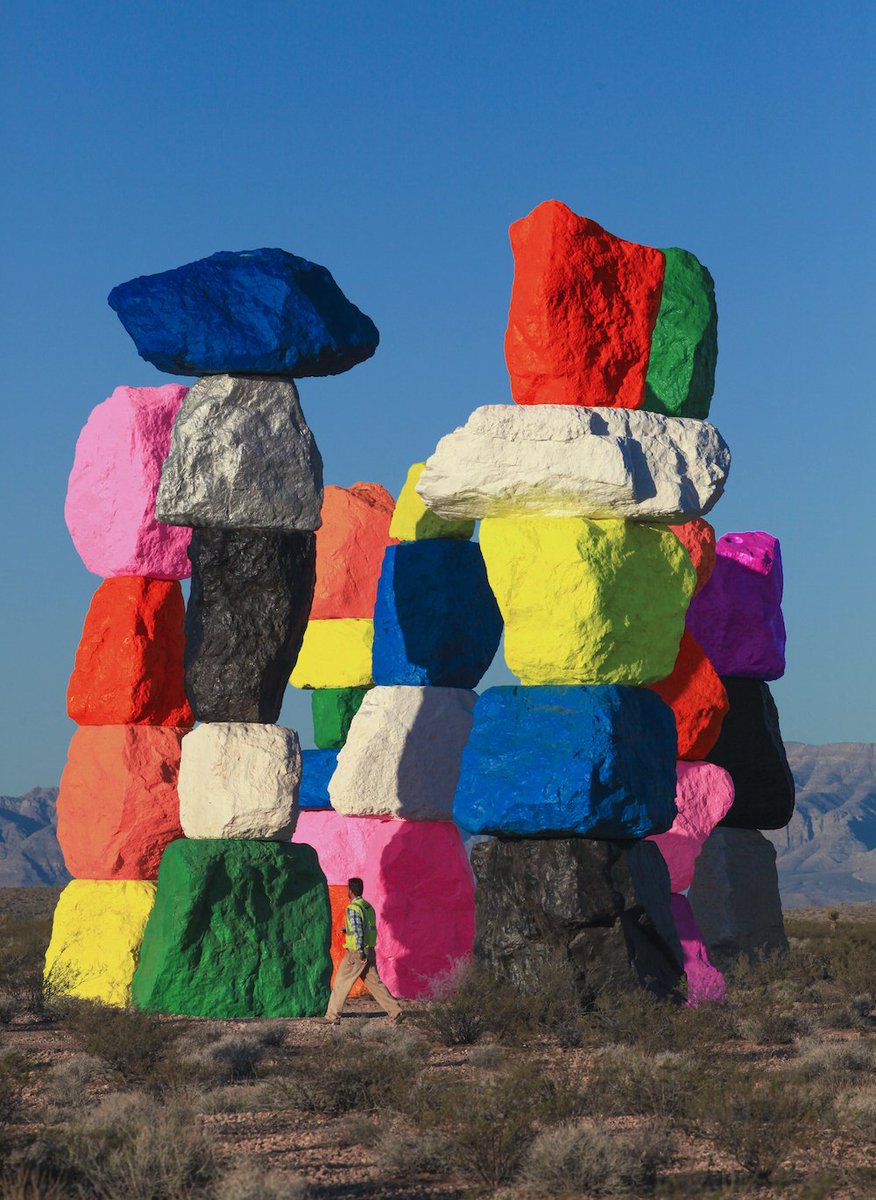 thisiscolossal's tweet photo. Seven 30-Foot-Tall Dayglow Totems Placed in the Desert by Ugo Rondinone https://t.co/OkHJePVUdB https://t.co/z0UjvQ4om5