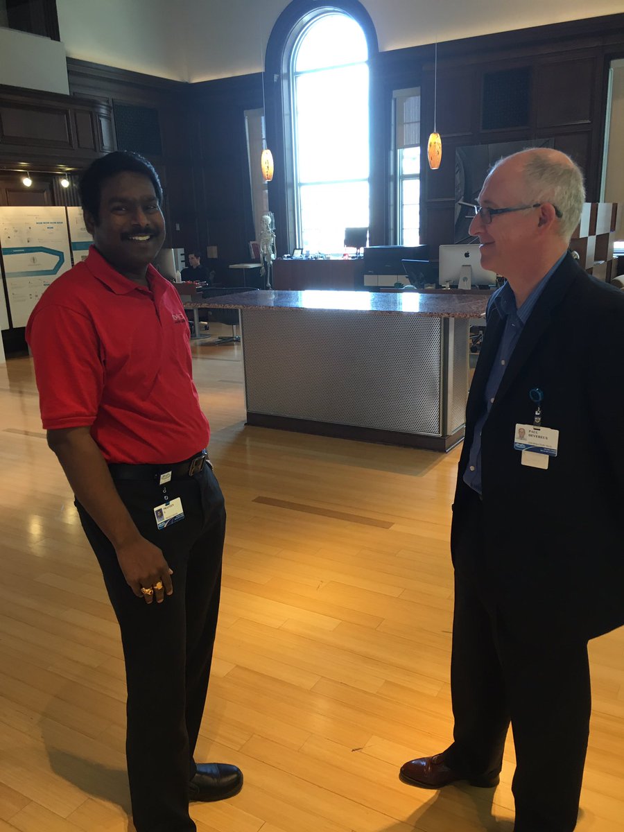 2OPtelemedicine's tweet image. Co-Founder Praveen, talking with a colleague. #2OP