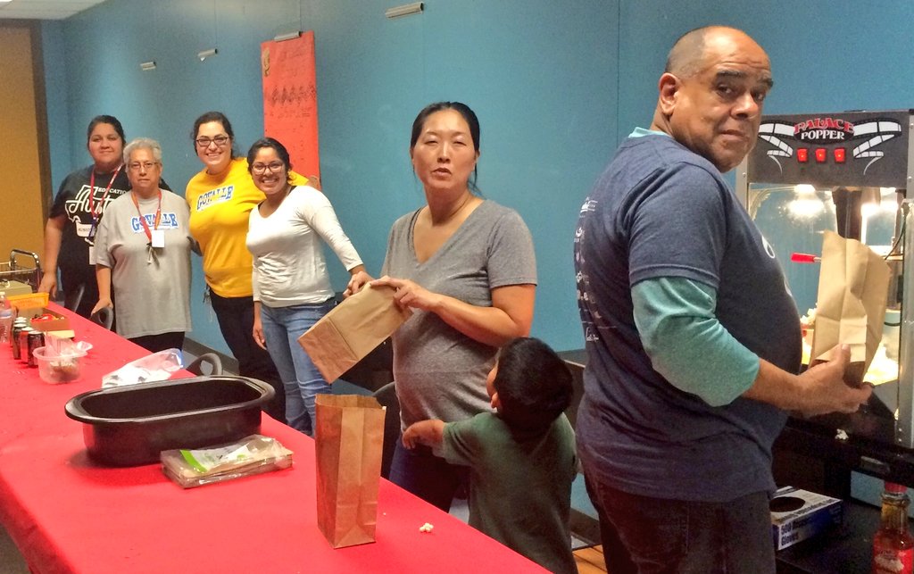 <a href="/GovalleRdrunner/">Govalle Elementary</a> PTA working hard for our families, supporting Movie Night!  @SELebrateEMVT #FamilyFunFriday