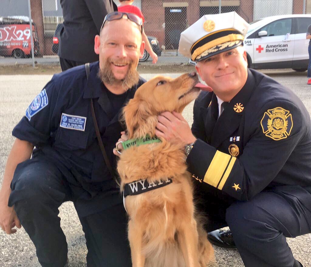 PhillyFireDept's tweet photo. We luv this pic of search dog Wyatt @Disastercanine showing ❤️ for his @PhillyFireDept #amtrak188 Incident Commander https://t.co/9rSmkrVunL