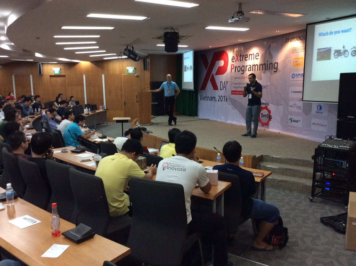From coder to craftman by <a href="/Outsourceit_Int/">Facilitated Work Hub Vietnam</a> , Oystein and Rehan on stage! #xpdaysviet #agile