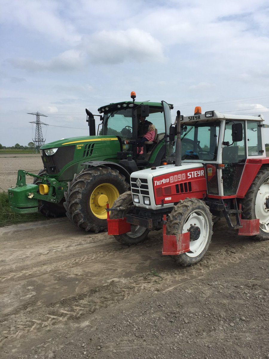 When you drive alone in the field, you think he is BIG ........ Untill his big brother come ......<a href="/TractorPictures/">TractorPicsDaily</a>