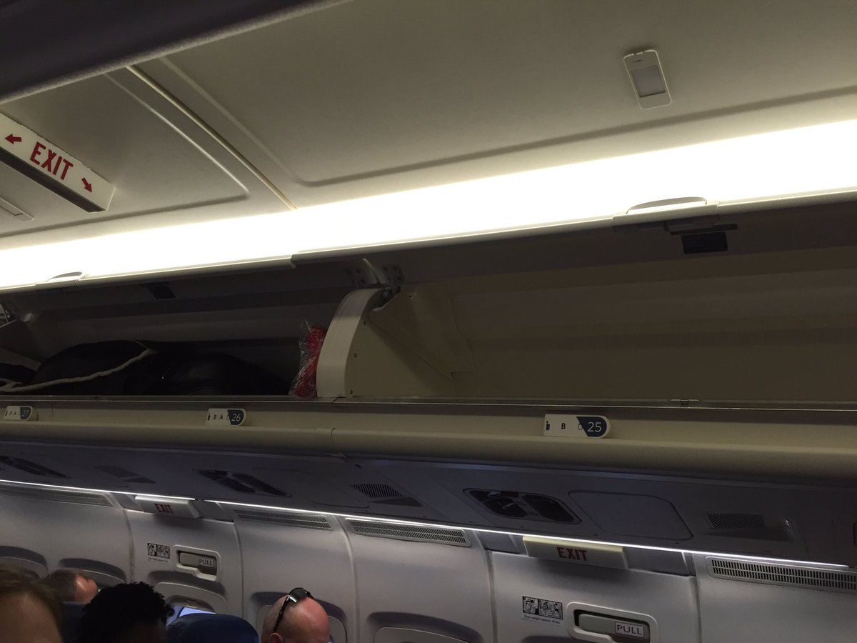 ellenvanoosten's tweet photo. @Delta 2nd time this week zone 2 passengers told to check bags yet empty bins all over the plane.... https://t.co/GTnrkFuGDH