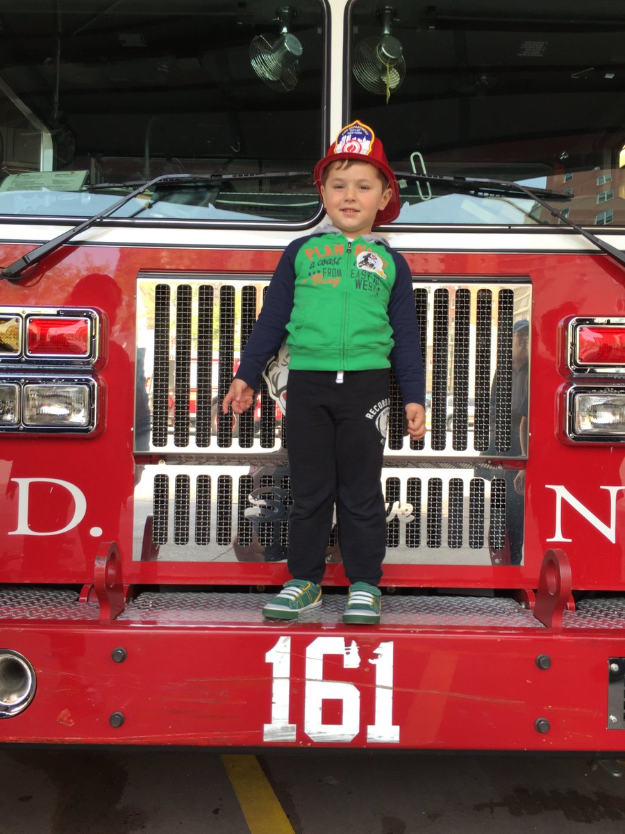 FDNY's tweet photo. #FDNYOpenHouse session 1 is still going for another hour! Here's a happy visitor at #Ladder161/#Engine245 #Brooklyn https://t.co/AbpxIltl9n