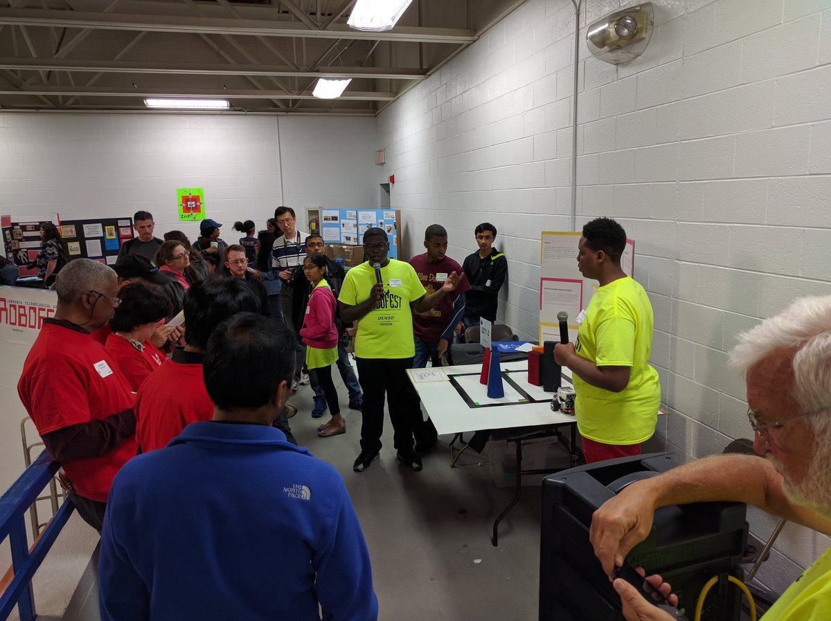 Team RoboScholars demonstrating the principles of self-driving cars at Robofest World Championships.