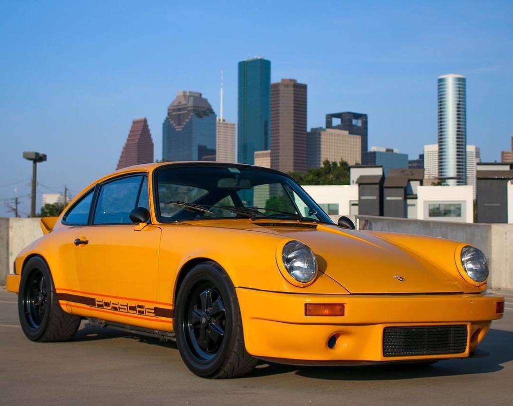 p911r's tweet image. The 1981 911SC with #HTX in the background.
#8T1SC #p911r #911SC #SignalYellow #Classic911 ift.tt/1rMvdsT