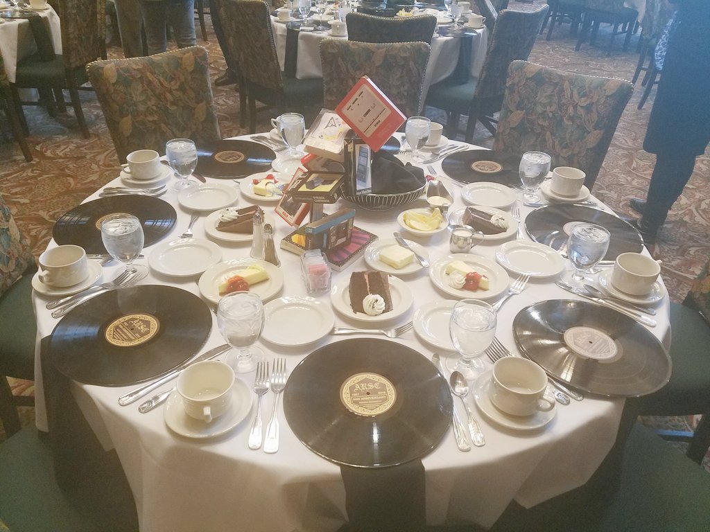 Danicord1018's tweet photo. The tables at the ARSC banquet were beautifully decorated! Dig the commemorative souvenir LP created for #ARSC50! https://t.co/0Xps8zZAY6