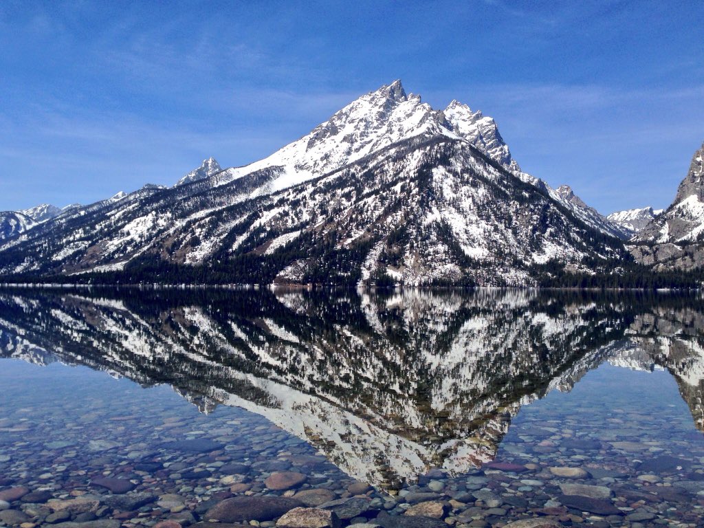 BenTutton's tweet photo. A perfect reflection of the Tetons while filming for #BBCThaw. #Earthonlocation https://t.co/c26W1GzASe