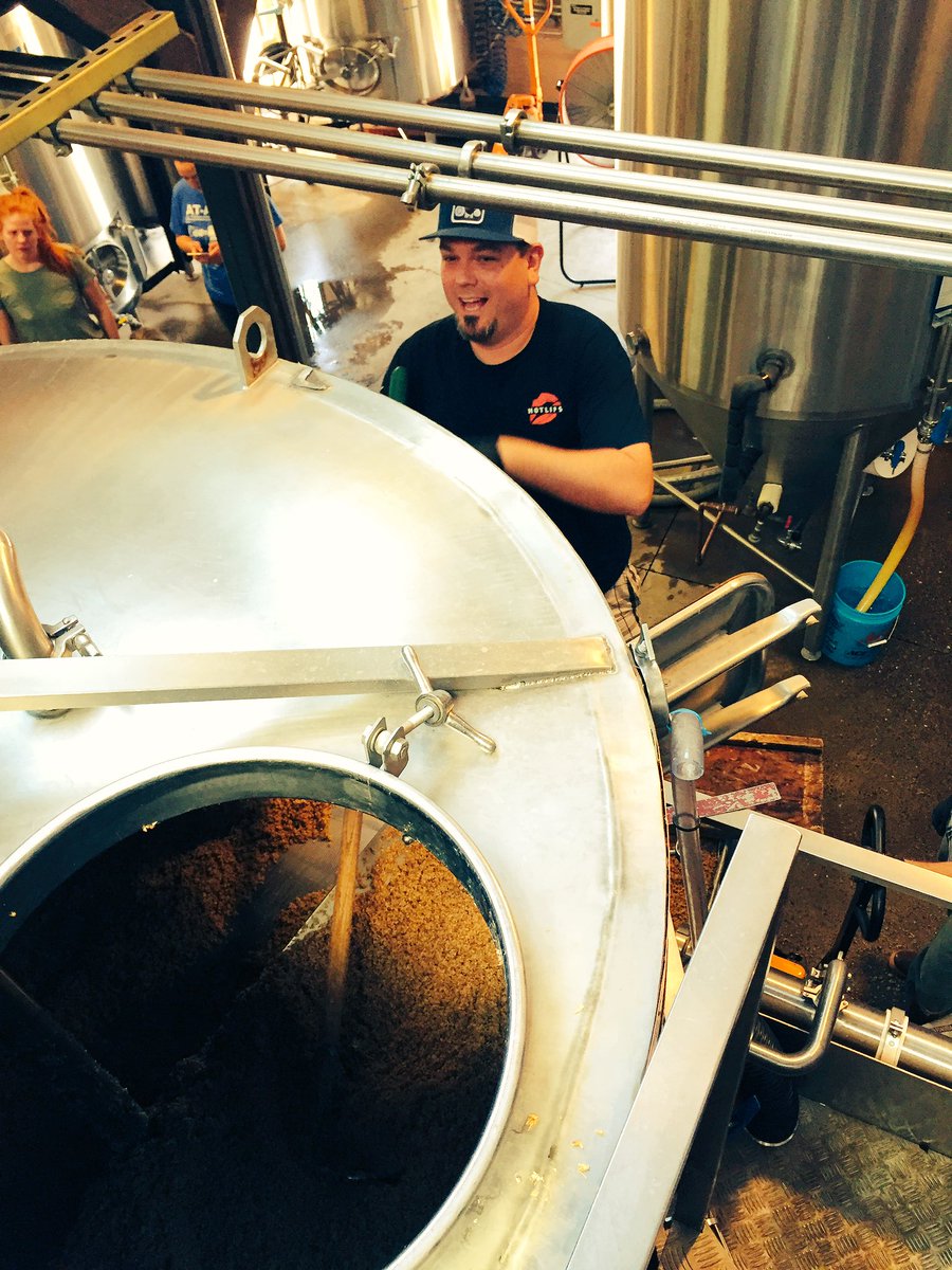EverybodysBrew's tweet photo. Brandon from @HOTLIPSpizza getting his hands dirty brewing with us on Friday! Get ready for #prideIPA! https://t.co/xJUt6daOuT