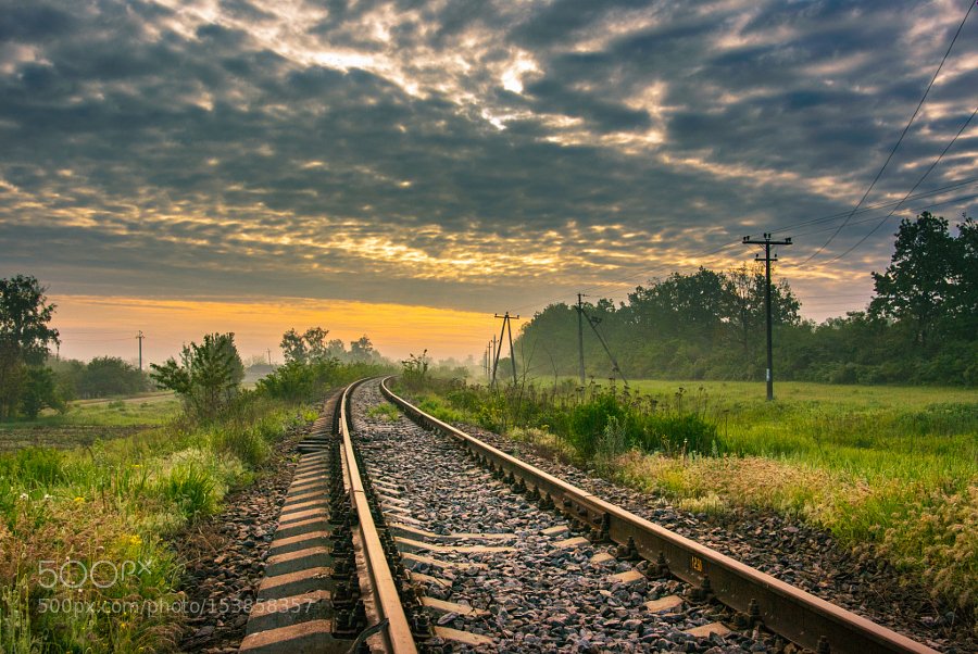 ZaibatsuPlanet's tweet photo. Dawn over the railway by ahtamar #photo https://t.co/DhhBXo7CfY