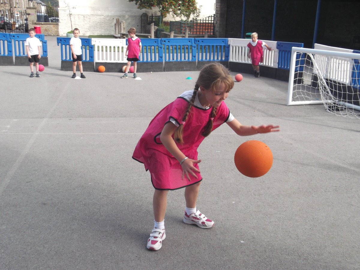 Watch how she keeps her eye on the ball at all times! We've been learning to dribble in handball!