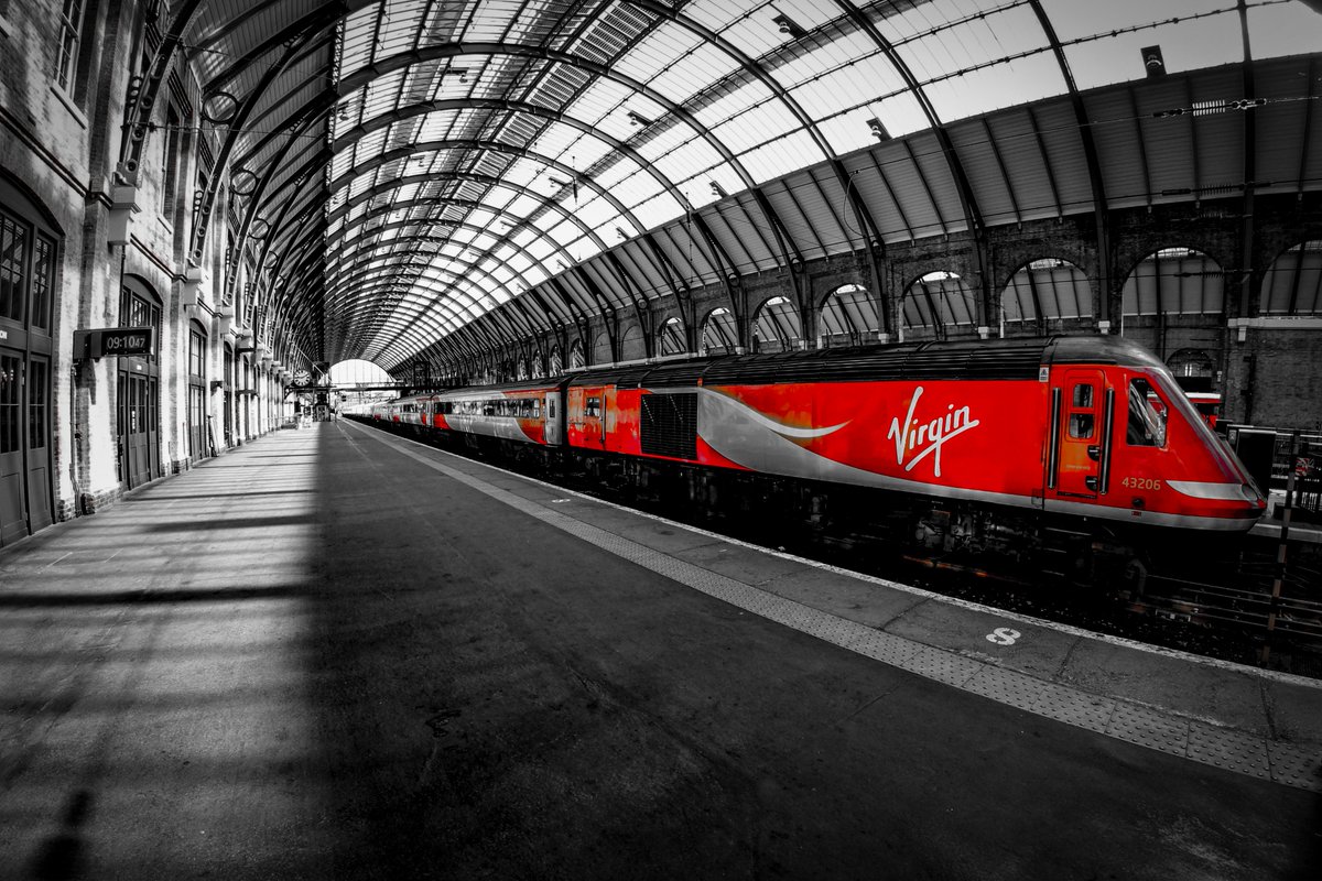 vosophotography's tweet image. RedVirgin Train in station #KingsCross  #ukphotography #londonrail #london #blackandwhite