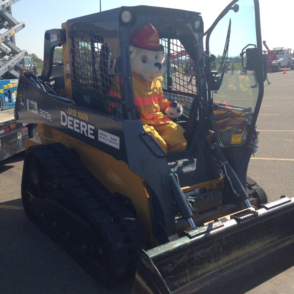 FirstStopRental's tweet image. Sparky got in our skidsteer at the TouchATruck event this weekend! If you came too, let us know what you thought!