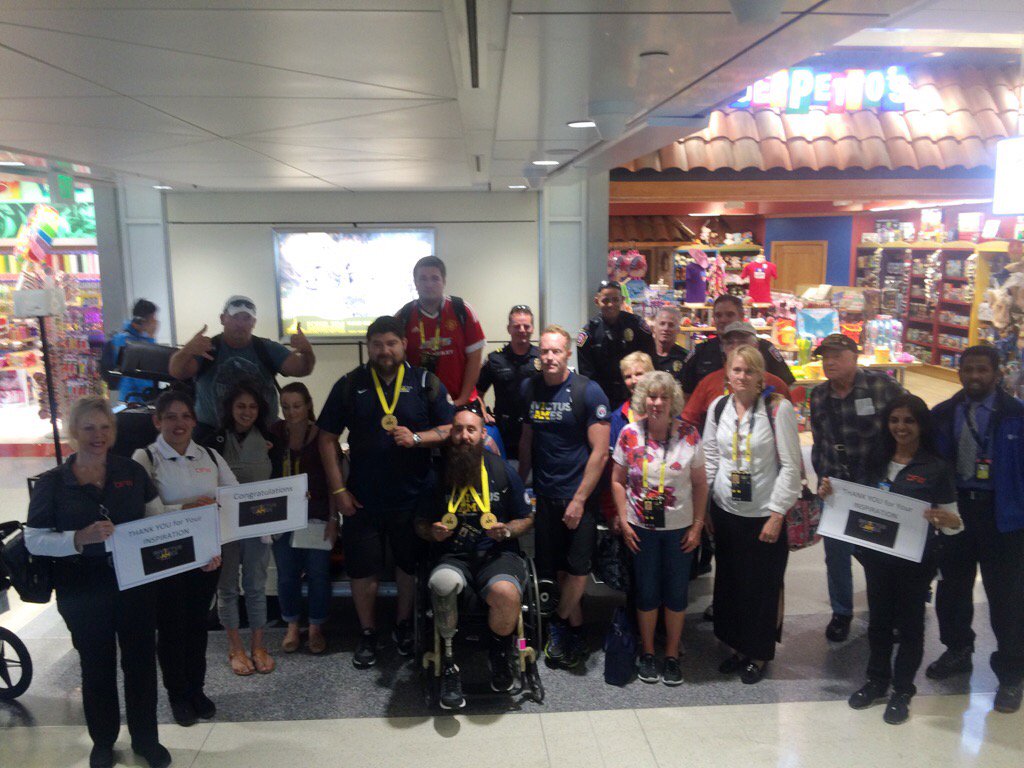 DFWAirport's tweet image. Welcome home, soldiers! This past weekend, #DFW greeted several Invictus Games competitors and their families.
